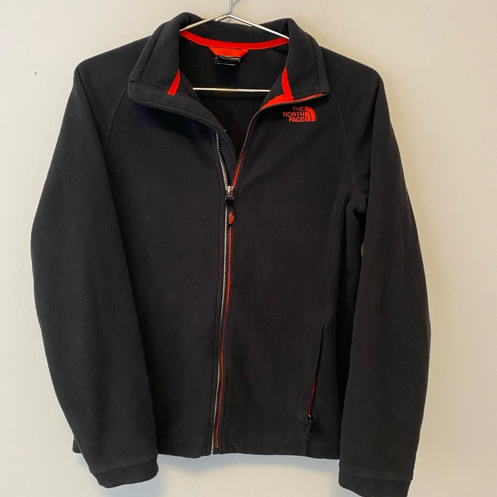 Black North Face jacket with red trim kids size 14/16 - large